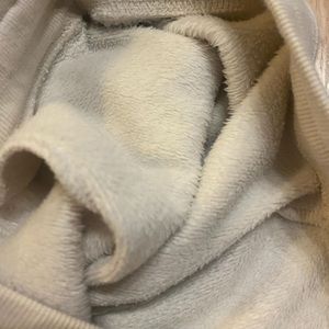 Cream coloured sweat pants with fuzzy inside